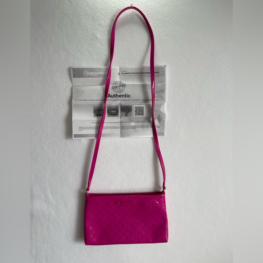 Kate Spade hot Pink Embossed crossbody missing‎ grommet from front tag